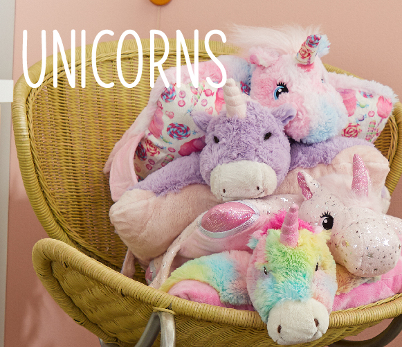 Click here to shop Unicorn Pillow Pets, highlighting the pink and white Sweet Scented Cotton Candy Unicorn Pillow Pet, the lavender Magical Unicorn Pillow Pet, and the pink Glittery Unicorn Pillow Pet.